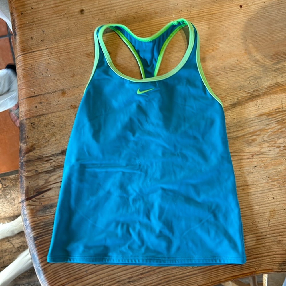Teal and green Nike tank.